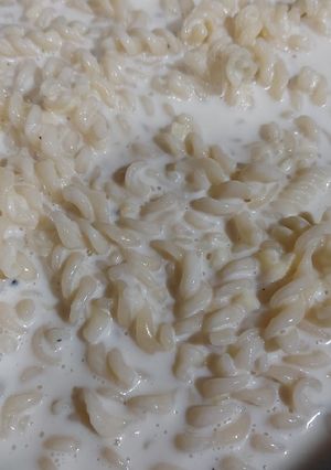 A picture of White sauce spiral pasta.