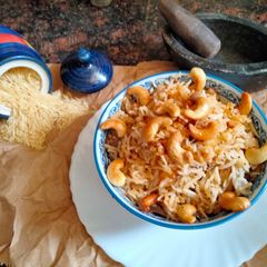 A picture of Onion and mustard seeds fried Rice.