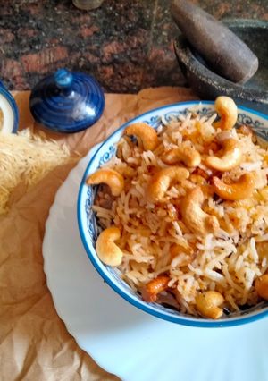 A picture of Onion and mustard seeds fried Rice.