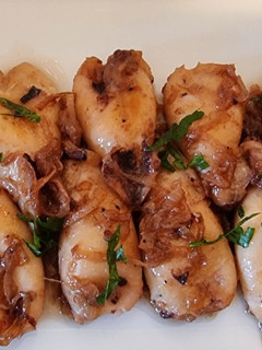 Una foto de Chipirones encebollados