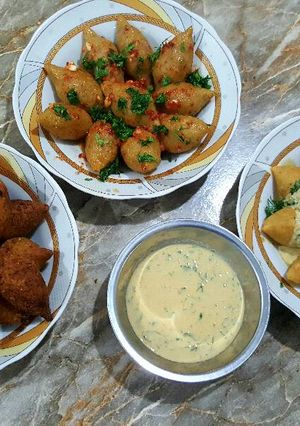 A picture of Fried Kibbeh and Boiled Kibbeh.