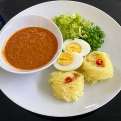 A picture of Angel Fish Curry Sauce with Rice Vermicelli.