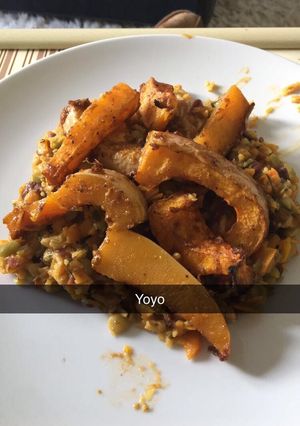A picture of Cajun roast squash with rice and peas.
