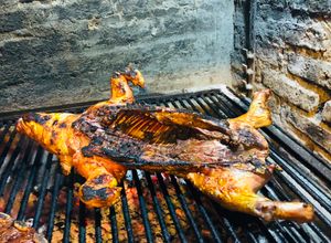 Una foto de Cochinillo a la parrilla🇺🇾🇯🇵子豚の丸焼き