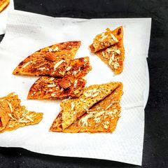 A picture of Sesame seeds and sugar paratha.