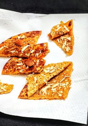 A picture of Sesame seeds and sugar paratha.
