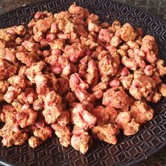 A picture of Spicy coated roasted peanuts.