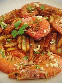 Una foto de Gambones a la plancha en salsa verde