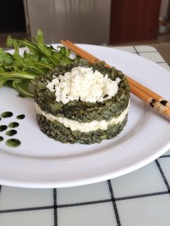 Una foto de Arroz con Spirulina y queso de cabra
