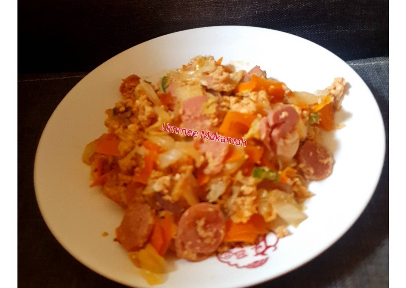 Scrambled eggs sauce with Sausages