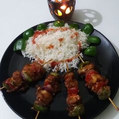 A picture of Shashlik stick with rice.