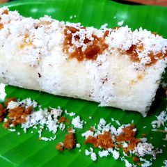 A picture of Puttu (Steamed rice flour cake).