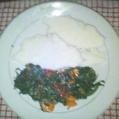A picture of Ugali with spinach.