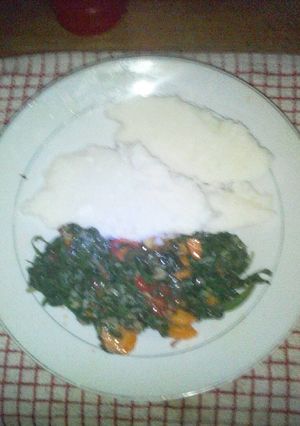 A picture of Ugali with spinach.