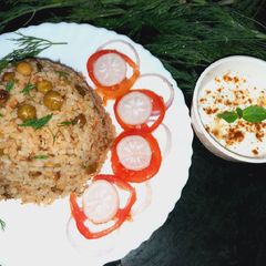 A picture of Matar pulau with dill leaves.