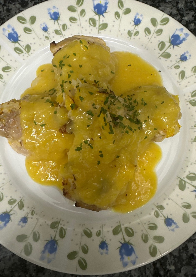 Una foto de 609. Contramuslos de pollo con salsa de naranja y limón en freidora de aire (principal carne)