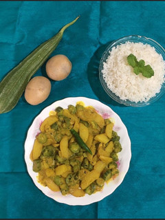 A picture of Jhinge Aloo Posto / Ridge Gourd In Poppy Paste.