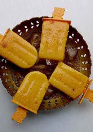 A picture of Mango Popsicles.