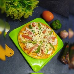 Veg pizza / ONION tomato CAPSICUM PIZZA A picture of Veg pizza / ONION tomato CAPSICUM PIZZA.