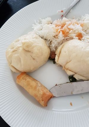 Una foto de Baozi o pan al vapor relleno chino