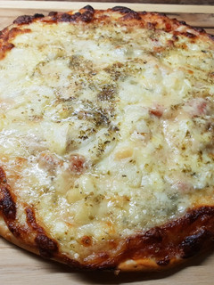 Una foto de Pizza de quesos sin gluten