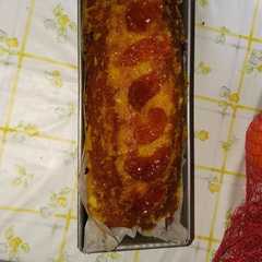 Una foto de Bizcocho de naranja con gajos de mandarina caramelizada 