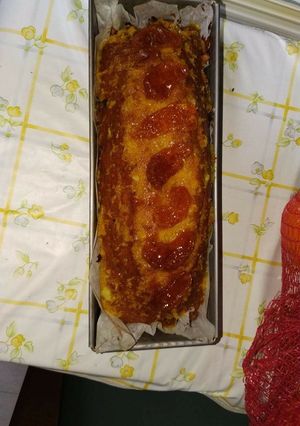 Una foto de Bizcocho de naranja con gajos de mandarina caramelizada 