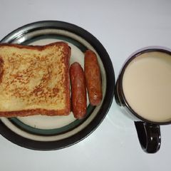 A picture of French toast with masala tea.