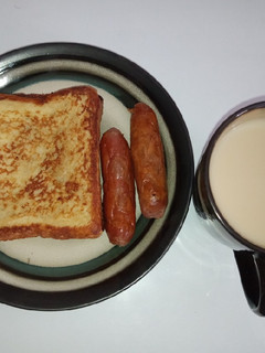 A picture of French toast with masala tea.