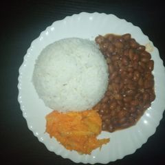 A picture of Beans... served with rice and pineapple carrot salad.