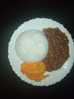 A picture of Beans... served with rice and pineapple carrot salad.