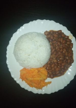 A picture of Beans... served with rice and pineapple carrot salad.