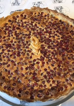 Une photo de Tarte à la grenade (pâte sablée aux mandarines)