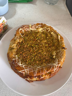 Una foto de Tarta de queso con pistachos