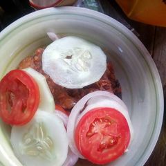 A picture of Peppered meat with vegetables.