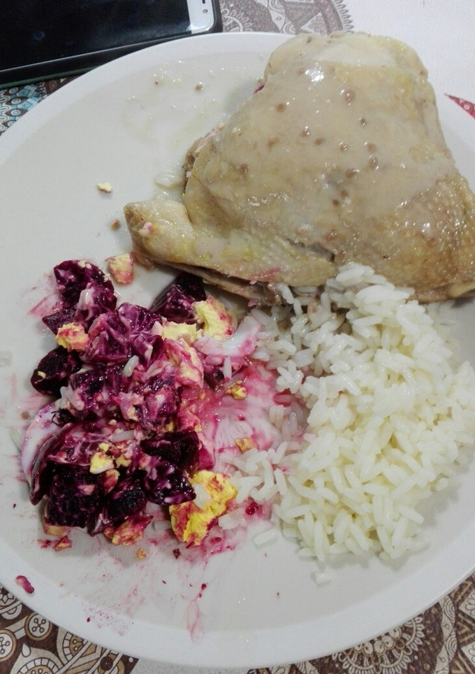Una foto de Cuarto trasero de pollo con arroz y salsa agridulce de frambuesa