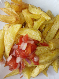 A picture of Chips with kachumbari.