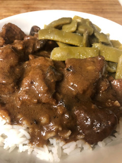 A picture of Beef and Mushrooms with Rice.