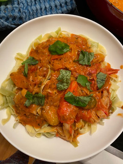 A picture of Crab Fettuccini w roasted tomato sauce.
