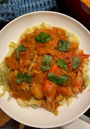 A picture of Crab Fettuccini w roasted tomato sauce.