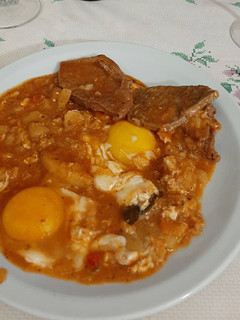 Una foto de Bifes a la Criolla