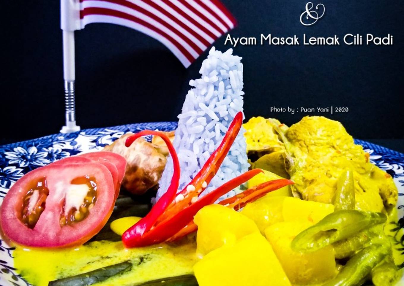 Nasi biru dan lemak ayam dimasak dengan cabai