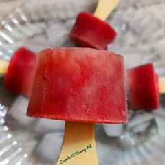 A picture of Watermelon popcicles.