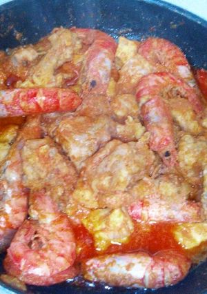 Una foto de Pollo Con Gambas