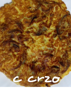 Una foto de Tortilla de setas de pie azul y queso