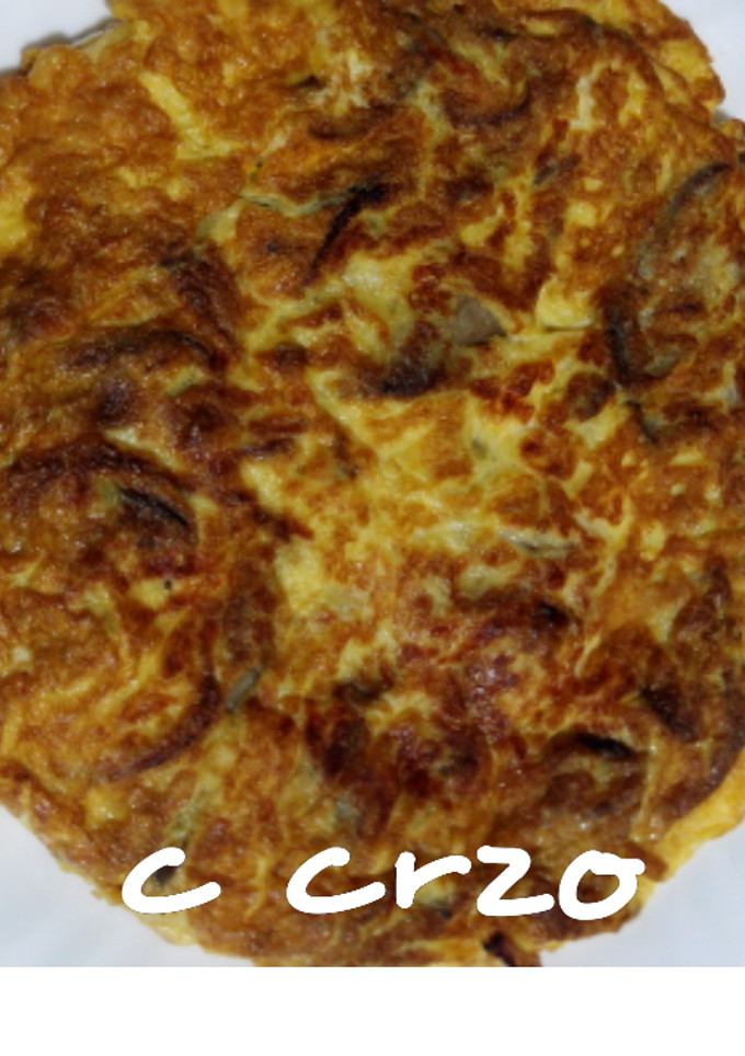 Una foto de Tortilla de setas de pie azul y queso