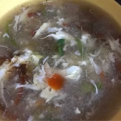A picture of Chicken corn soup.