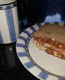 Derretido de queso y mortadela
