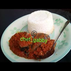 A picture of Rice with fish stew.