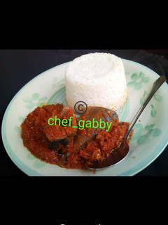 A picture of Rice with fish stew.